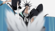 Kenpachi slams Nnoitra into the ground.