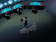 Nemu stands by as Mayuri delegates his task to his researchers.