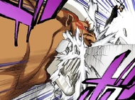 Yammy bites through the building Ichigo is standing on.