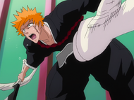 Dordoni kicks Ichigo hard in the midsection.