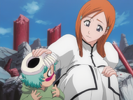 Orihime Inoue assures Nel that Ichigo will win.