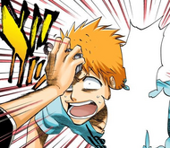 Ichigo presses his Substitute Shinigami Badge against Kon's forehead to knock out his pill.