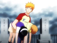 Kon takes Yuzu and Karin away from the fight.