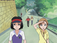 Karin and Yuzu lead the way to Masaki's grave.