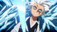 Hitsugaya's Ice clone slashed in two by Harribel as she uses Trident.