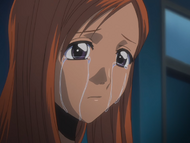 Orihime cries after recalling Byakuya Kuchiki protecting Rukia.