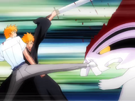 Ichigo and Kon defeat the Millipede-like Hollow in unison.