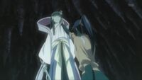 Yoruichi agarrando a Tobiume