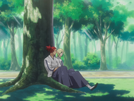 Izuru and Renji sit under a tree.