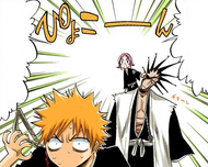 Yachiru appears from behind Kenpachi's shoulder, startling Ichigo.