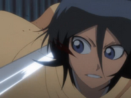 Rukia is suddenly attacked by Aaroniero.