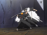 Kenpachi attacks Ichigo.