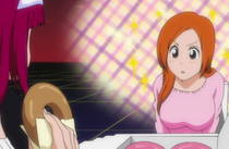 500px-Orihime looks hungrily at donuts