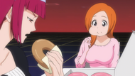 Riruka and Orihime talking over doughnuts.