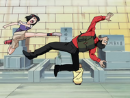 Isshin being kicked by Karin.