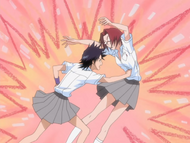 Tatsuki punches Chizuru for making another advance on Orihime.