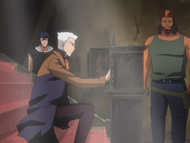 Koga stands by as Kariya repairs the grandfather clock.