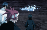 Renji looks on as Gunjō crumbles while laughing.