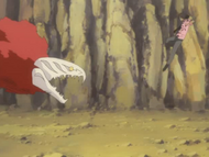 Sado leaps away from Hihiō Zabimaru.