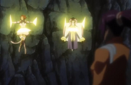 Yoruichi immobilizes Haineko and Tobiume.