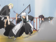 Hinamori and Izuru's fight is interrupted by Hitsugaya.