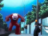 Ichigo confronts a pig-like Hollow.