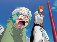 Orihime watches as Nel cheers on Ichigo.