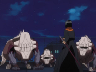 Yumichika Ayasegawa confronts three Arrancar clones.