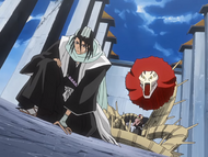 Byakuya is forced to one knee by Renji.