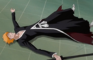 Ichigo struggles to get up.