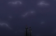 The cloud of poisonous gas moves toward Rukia and Renji.