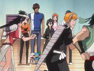 Rukia watches as Kūkaku chases Ichigo and Ganju around the room.