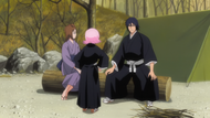 Yachiru listens as Masayoshi talks about his wife's death.