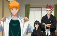 Ichigo holds Hitsugaya's haori.