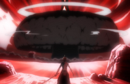 The Getsuga Tenshō explodes behind Ichigo.