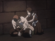 Hanatarō treats Ganju's injuries after healing Ichigo.