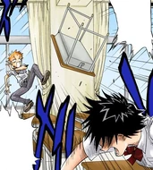 Tatsuki throws a desk at Kon.