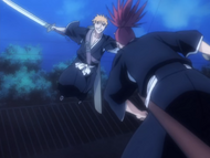 Ichigo pursues Renji across the rooftops.