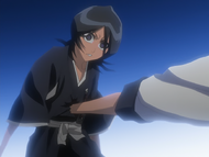 Grimmjow impales Rukia on his hand.