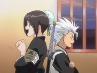 Hitsugaya startles Hinamori by appearing behind her.