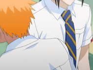 Ichigo bumps into Uryū.