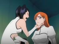 Loly yells at Orihime for mentioning Aizen.