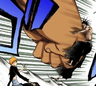 Yammy punches Kenpachi away from Ichigo.