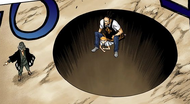 A large hole appears underneath Ichigo and Tessai.