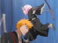 Yachiru Kusajishi jumps onto Ichigo's shoulder in an attempt to move to Hanatarō.