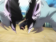 Ichigo vertically bifurcates a Hollow, purifying it.