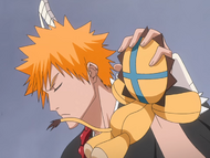 Ichigo stops Kon from staying with Rukia.