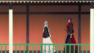 Ginrei and Kōga walk along a hallway.