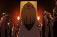 Unohana and the other captains attend a meeting regarding the recent incursion.