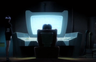 Mayuri sits at his computer with Nemu standing nearby.